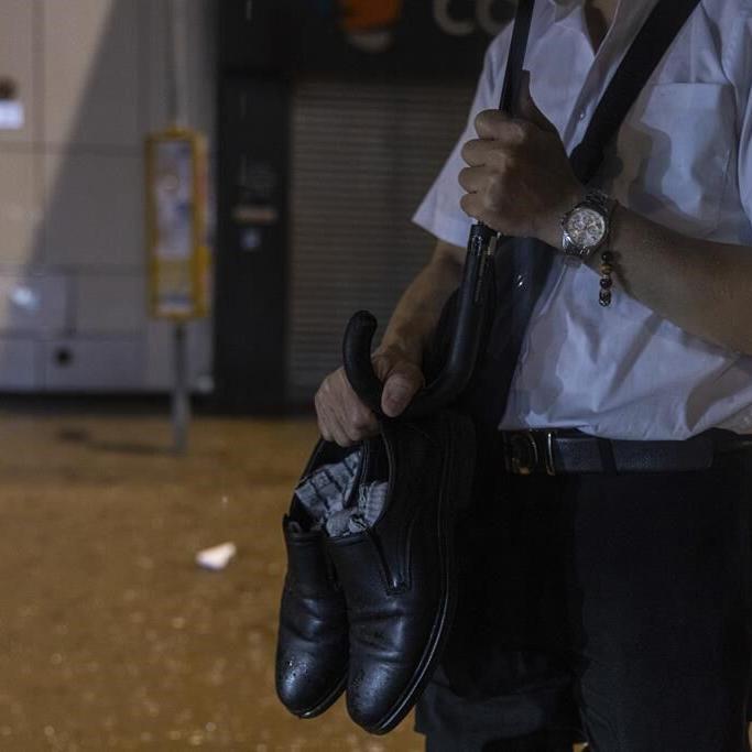 Hong Kong closes schools as torrential rain floods streets, subway station